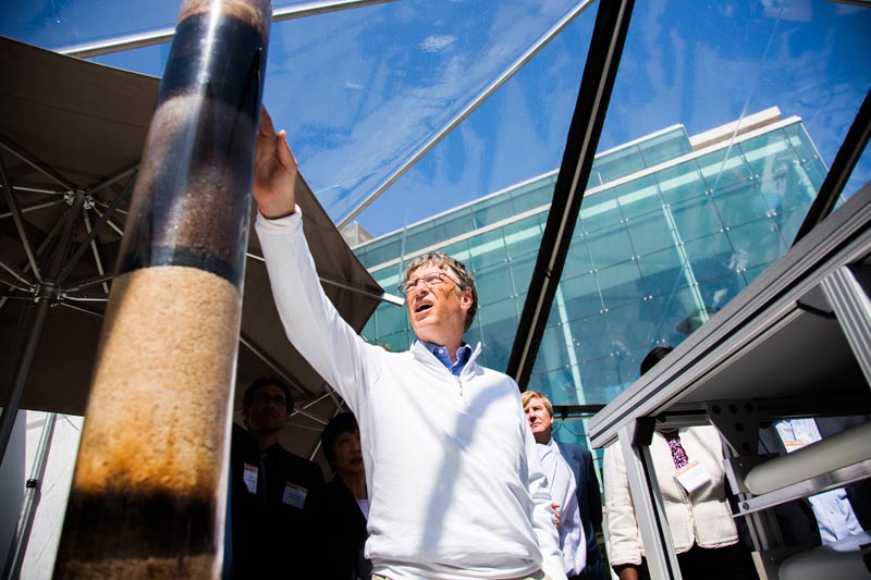 Bill Gates viewing another sanitation invention at the fair