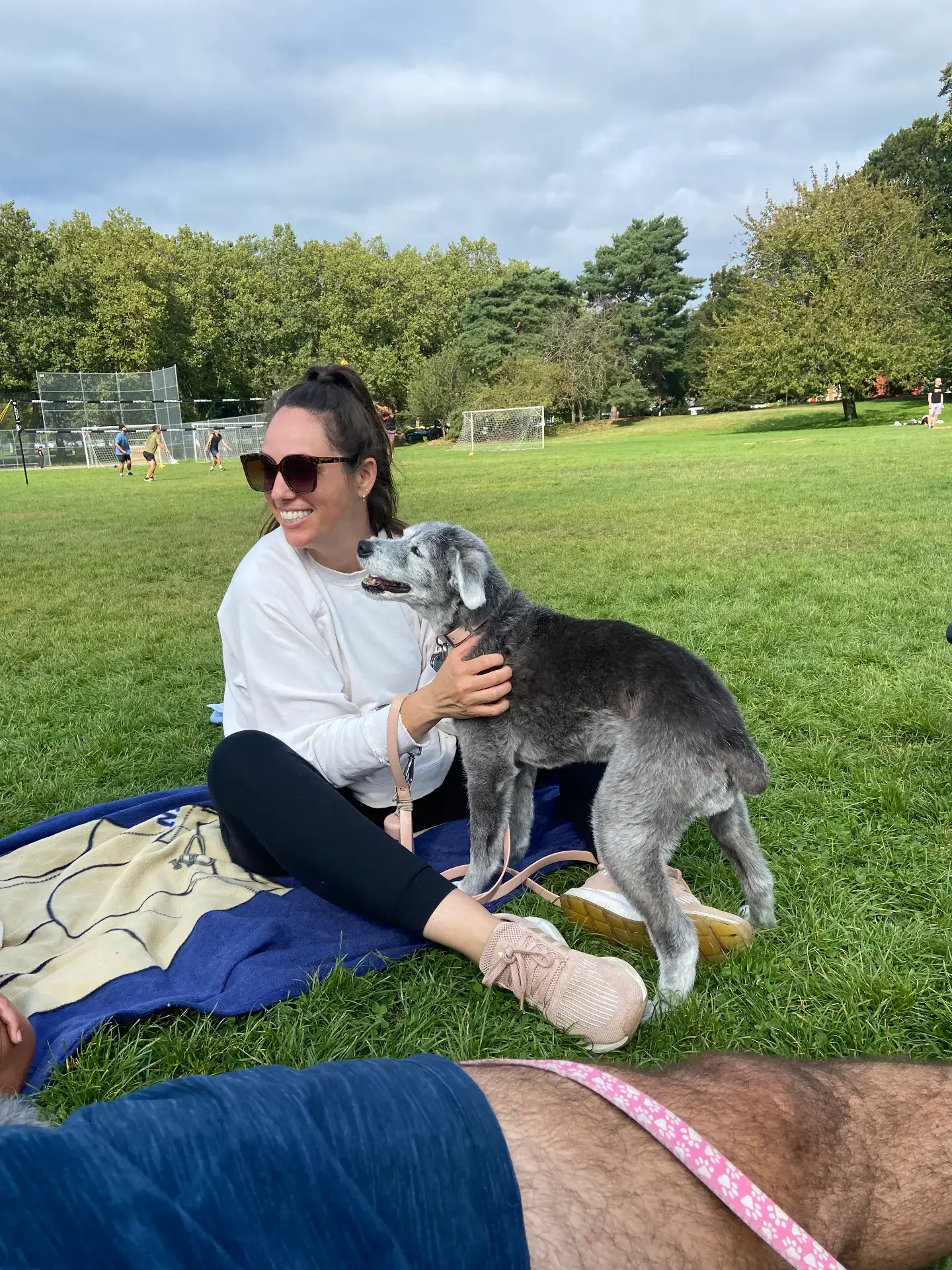 Ali with her dog Rascal outdoors
