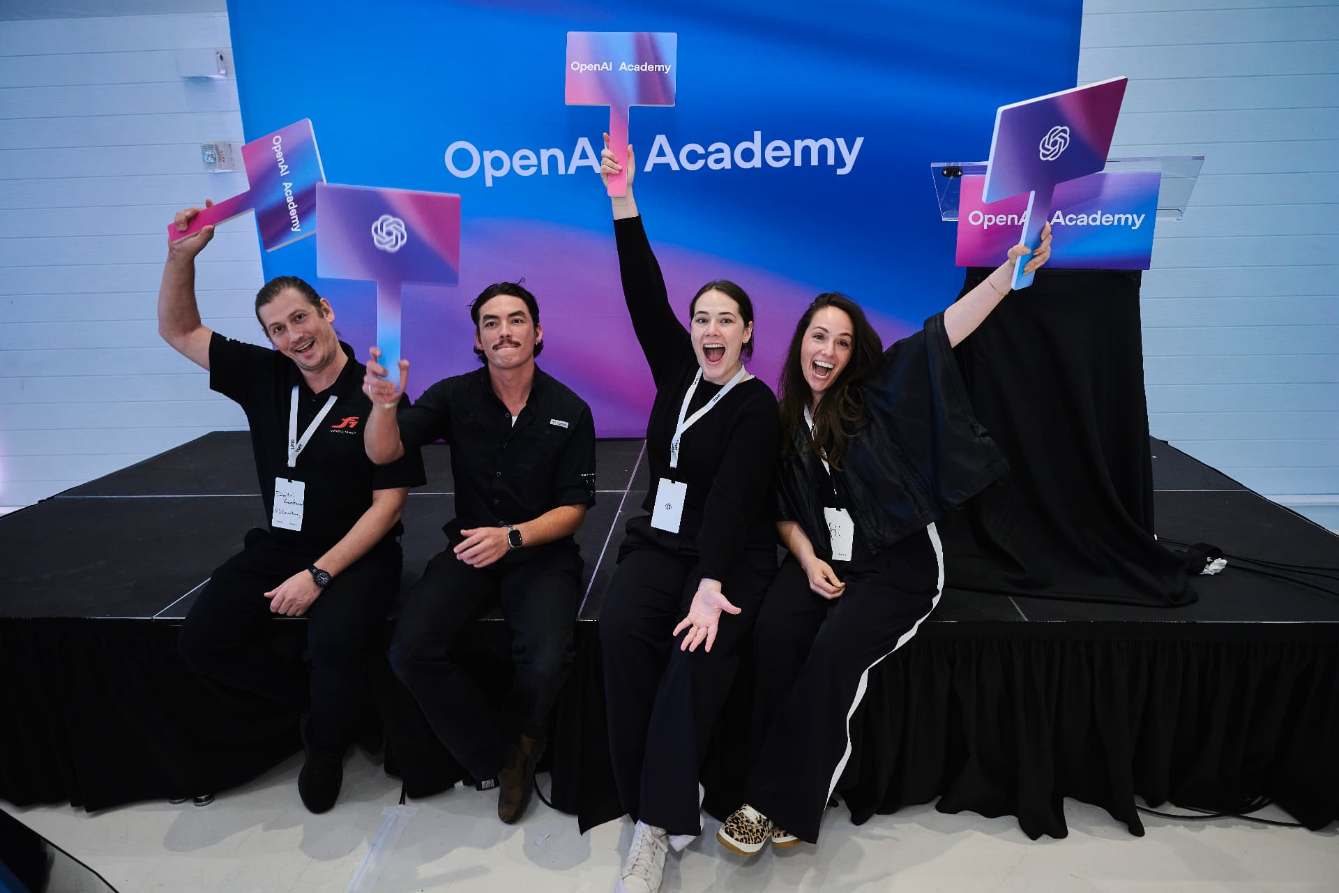 A speaker on stage at OpenAI Jam in New York